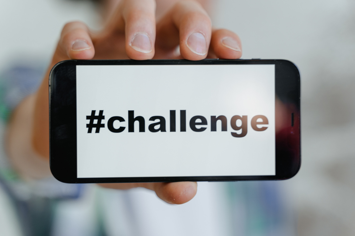 Close Up Shot of a Smartphone with Challenge