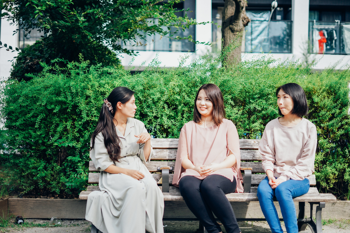 Mom and friends talking in the park