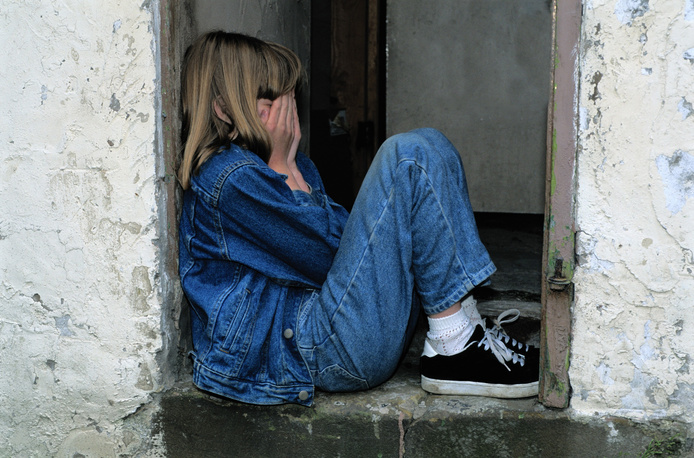 Lonely Child in the Doorway