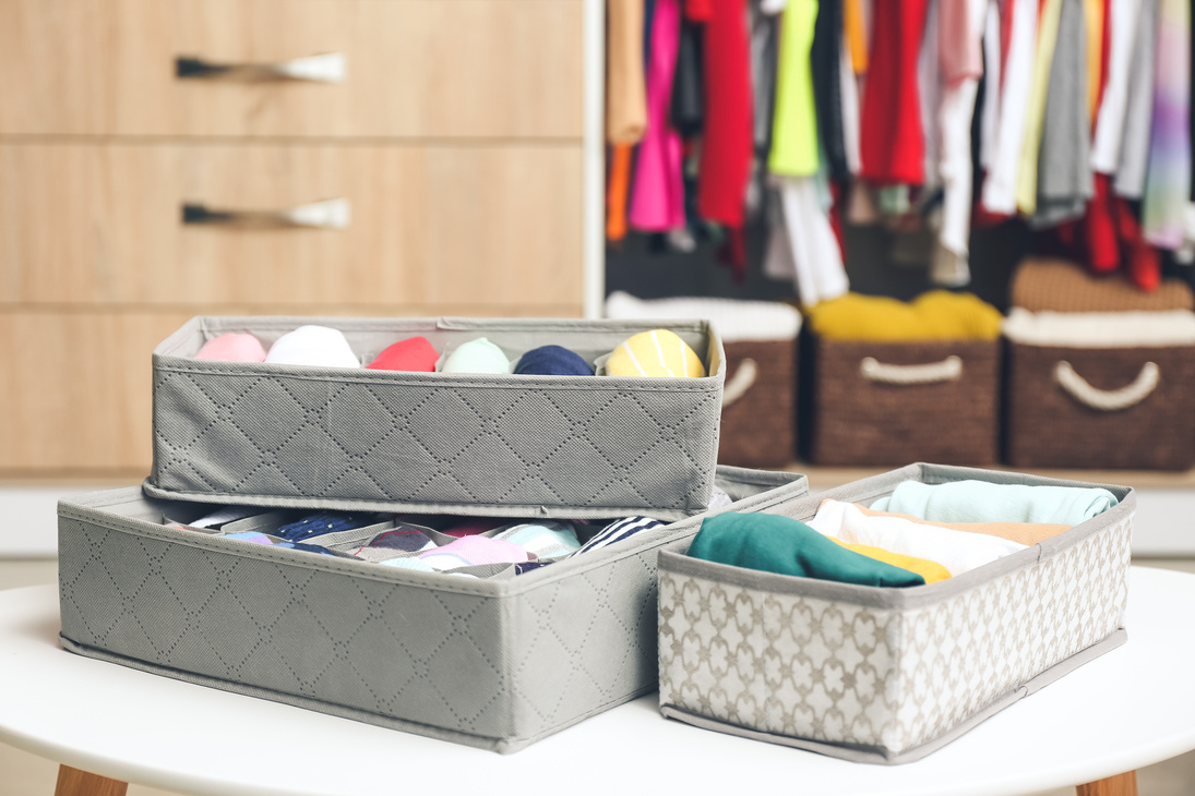Organizers with Clean Clothes in Closet